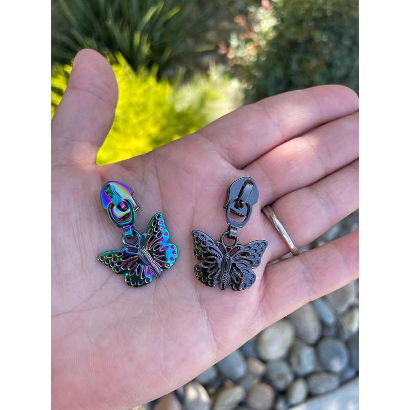 Butterfly zipper pulls