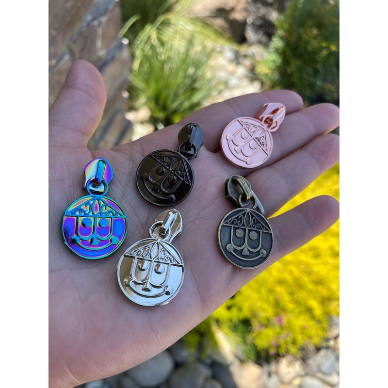 Clockface zipper pulls
