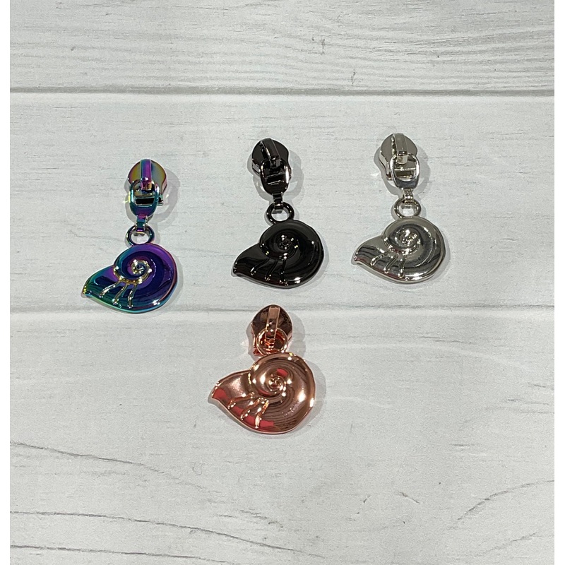 Shell zipper pulls