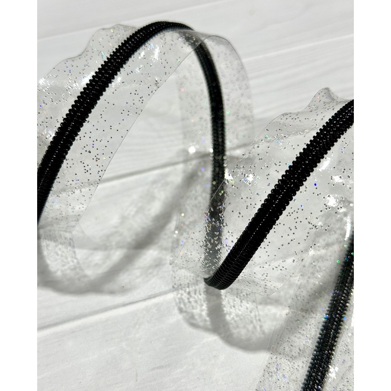 Clear holographic sparkle vinyl zipper tape with black teeth