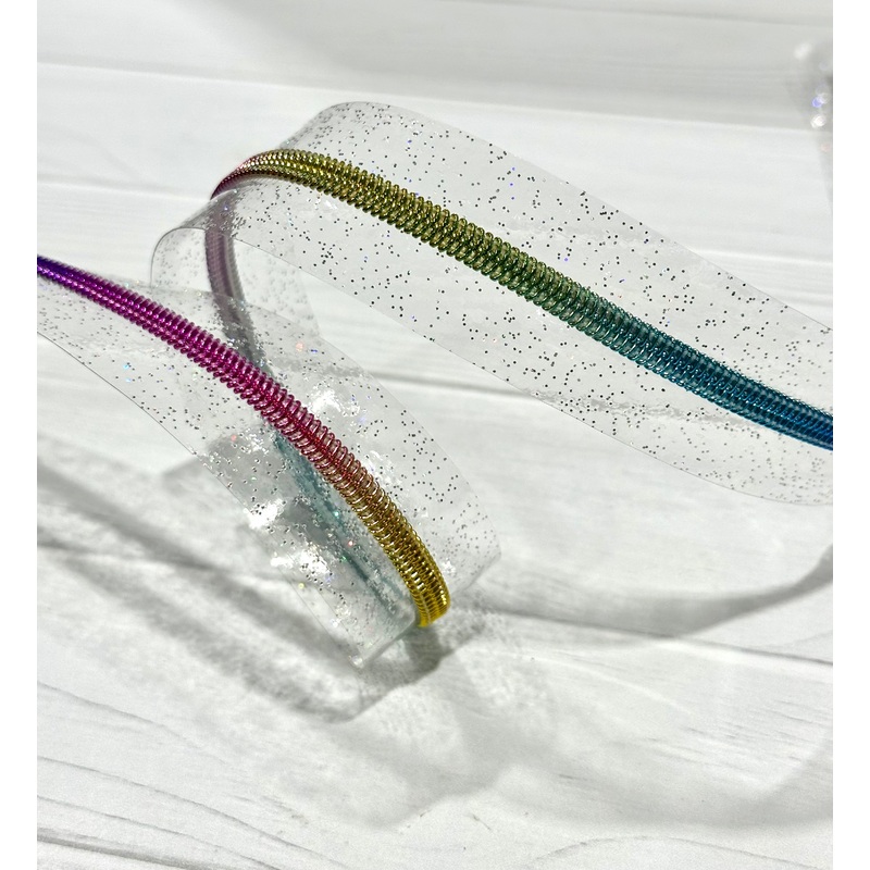 Clear holographic sparkle vinyl zipper tape with rainbow teeth