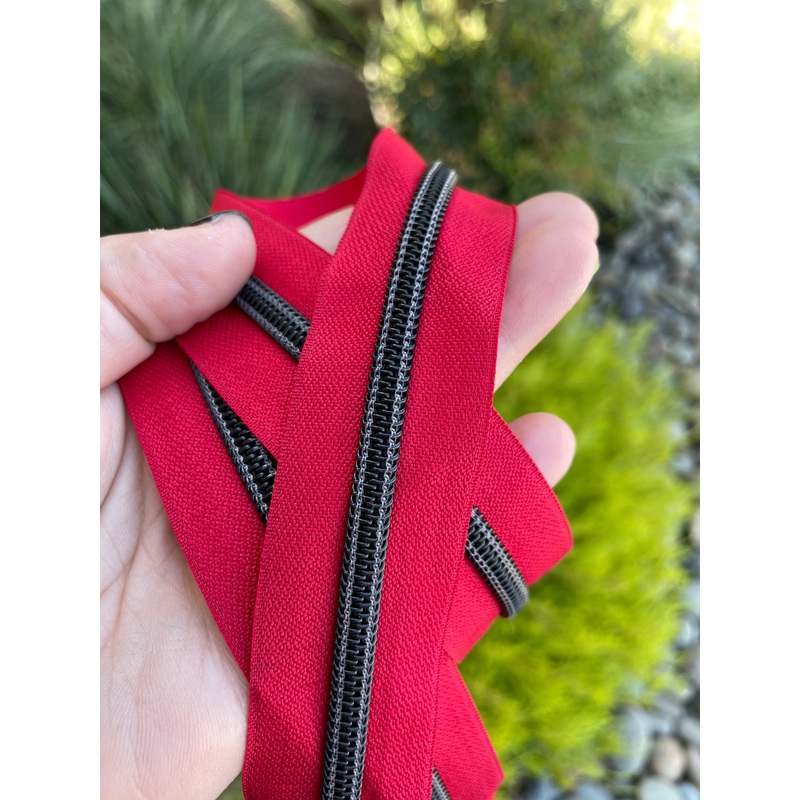 Cherry Red zipper tape with black teeth